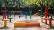 © atipong - Empty colorful children playground set in park Sandbox on foreground Playground set with no children Play yard with sandbox balance and other playground elements Outdoor playground Sandy ground