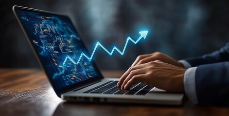 Analyzing data trends with a laptop in a modern workspace at night