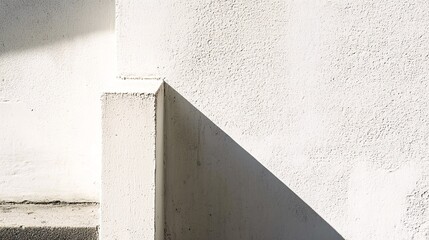 Aufkleber - White wall casting strong shadow on building facade