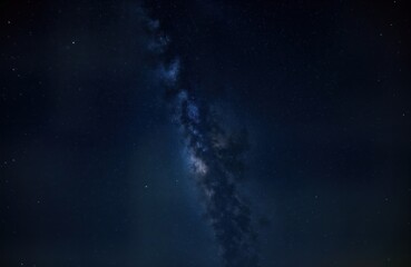 Wall Mural - night sky texture with milky way. dark starry background. amazing cosmic scene. visual element for s