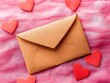 © bvbflo1 - Love letter envelope with paper craft hearts on soft pink background
