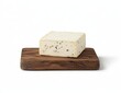 © tolem929 - Creamy cheese block on rustic wooden board.