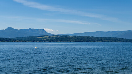 Wall Mural - Beautiful Shuswap Lake on a sunny summer day near Herald Provincial park British Columbia Canada