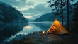 © eartist85 - Orange lit inside tent and fire next to the tent over misty river at sunset landscape
