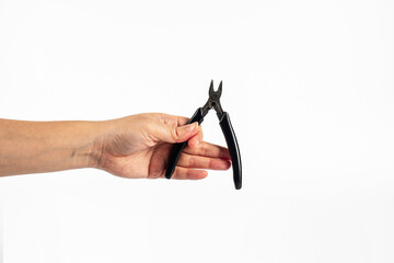 Wall Mural - Pliers in hand isolated on the white background