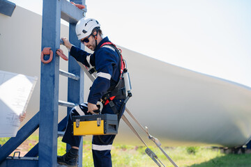 Wall Mural - engineer team working in wind turbine farm. maintenance engineer working in wind turbine.