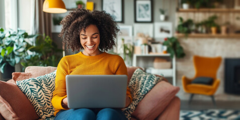 Aufkleber - A woman enjoys her time on the couch while working on her laptop in a cozy living room. Surrounded by plants and warm lighting, she looks content and engaged, embracing her pregnancy journey at home.