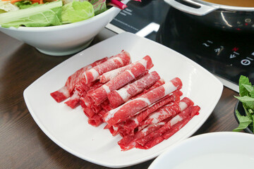 Sticker - Shabu Shabu. Thinly sliced ​​beef on a plate