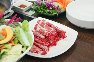 Sticker - Shabu Shabu. Thinly sliced ​​beef on a plate