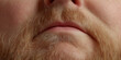 © Lila Patel - Close-up of Male Face with Light Blond Mustache and Goatee
