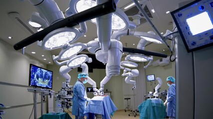 Poster - Surgeons perform a complex operation in a modern surgical theater with advanced lighting and equipment