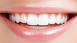 © nuanjan - Radiant smile closeup of woman perfect bright white teeth exemplifying health and confidence