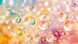 © Amar Tv - Colorful soap bubbles floating in soft pastel background, creating a dreamy and whimsical atmosphere