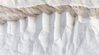 © Moonroad - A close-up view of layered white rock formations, showcasing smooth, chiseled edges and an intriguing texture.