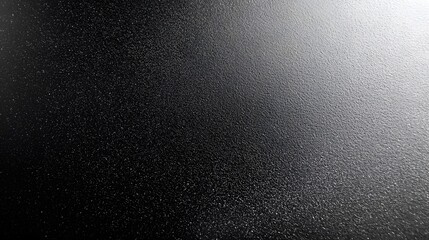 Leinwandbilder - Matte black powder coated metal surface with a grainy rough textured finish providing a minimal dark plain backdrop ideal for industrial