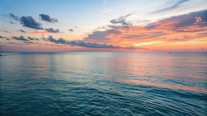 Wall Mural - peaceful blue ocean scene at sunset with sky, ocean scenery, calming atmosphere, blue watercolor pai
