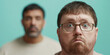 © Lila Patel - Close-up Portrait of Two Men, One in Focus, One Blurred