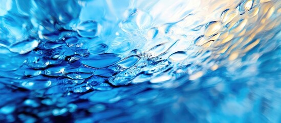 Wall Mural - abstract motion blurred blue glass background with water droplets and space for text design