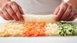 © Raitalinn - Fresh ingredients skillfully prepared for sushi rolling on a clean surface