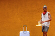 © ADDICTIVE STOCK - LGBTQIA+ man preparing for a sunny holiday adventure