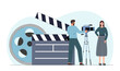 © Rudzhan - Illustration of a man operating a camera and a woman posing on set. Includes a clapperboard and film reel on a light background. Concept of filmmaking. Vector illustration