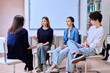 © Valerii Honcharuk - Group mental therapy, teenagers students talking with female psychologist, school counselor