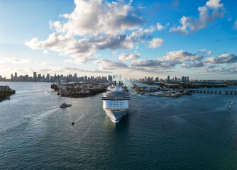 Miami tour. Cruise ship voyage. Aerial view of cruise in summer vacation. Cruise ship tour and travel at sea. Aerial view of luxury liner voyage. Ship leaving Miami beach port. Scenic deck views