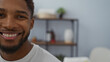 © Krakenimages.com - Handsome man smiling indoors at a spa with wellness interior decor and a relaxed atmosphere.