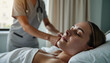 © Nikole24 - Nurse giving massage to relaxed patient in healing environment