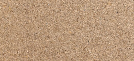 Wall Mural - brown paper eco recycled, kraft paper sheet texture cardboard for background.
