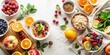 © Pluto - A vibrant overhead flatlay showcasing a delightful arrangement of fresh fruit, berries, and healthy breakfast cereals, perfect for a nutritious and delicious start to the day.