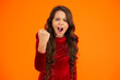 © be free - Threatening with anger. Teen girl angry threatening with curly hair. Girl teenager expressing aggression. Angry teen girl threaten with fist. Girl feel anger isolated on orange