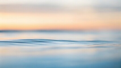 Wall Mural - Surface texture of silky smooth soft ocean surface, shot at sunrise while swilling in the ocean of Western Australia.

