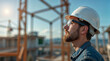 © ASPmedia - happy builder engineer in helmet on construction site background . Generative AI