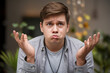 © Emanuel - Confused caucasian guy holding breath, pouting and staring