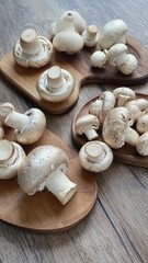 Wall Mural - Gourmet White Mushrooms on Rustic Wooden Boards, A Culinary Still Life