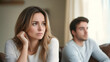 © dang - Serious sad woman thinking over a problem, man aside, meeting therapist, poor chance of getting pregnant after 40, unmet expectations, unable to handle family finances, interested in different things