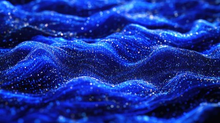 Abstract blue wavy surface with glittering particles.