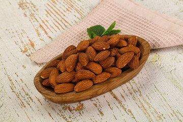 Wall Mural - Tasty ripe almond nuts heap