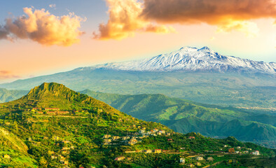 Wall Mural - beautiful panorama of Etna vulcano in Italy, Sicily, Taormina to mountain landscape with white snow peak and green hills and valleys arround