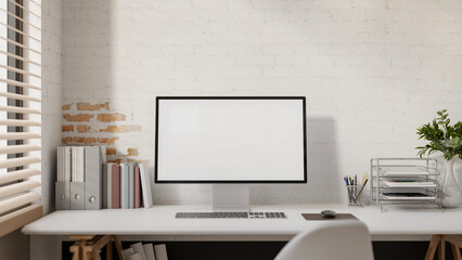 Wall Mural - a computer and decorative items placed on a white desk against a white brick wall.