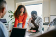 © Flamingo Images - Diverse Team Enjoying a Collaborative Business Meeting in Bright Office
