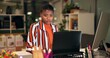 © peopleimages.com - Reading, laptop and online with business black woman in office for magazine layout, art director and overtime. Media publication, creative project and research with person in design agency at night