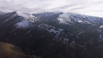 Wall Mural - Mountain Ranges During Winter - Aerial Drone Shot