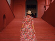 © YURII Seleznov - Young woman in ethnic dress and hat exploring the vibrant streets of Malacca, Malaysia. A blend of cultural heritage, colorful architecture, and tropical charm. Perfect travel and lifestyle moments.