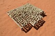 © Egmont Strigl/imageBROKER - Renewable energy, balls of recycled paper, papier mache, paper mache, drying in the sun, Namibia, Africa