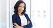 © peopleimages.com - Happy, career and portrait of businesswoman in office with confidence for legal job growth. Smile, pride and female corporate attorney from Mexico with arms crossed for law case in workplace.