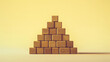 © crazyass - Building future success ascending wooden block pyramid with human icons studio conceptual minimalist