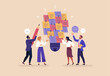 © nadzeya26 - Business Workshop Concept. Vector cartoon illustration of a group of diverse people discussing an idea made from sticky notes light bulb-shaped. Isolated on background.