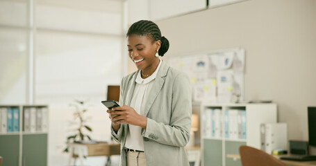 Fototapete - Businesswoman, smile and typing on phone, communication and networking in office on technology. Happy black person, smartphone and connection or online research or email, mobile app and website